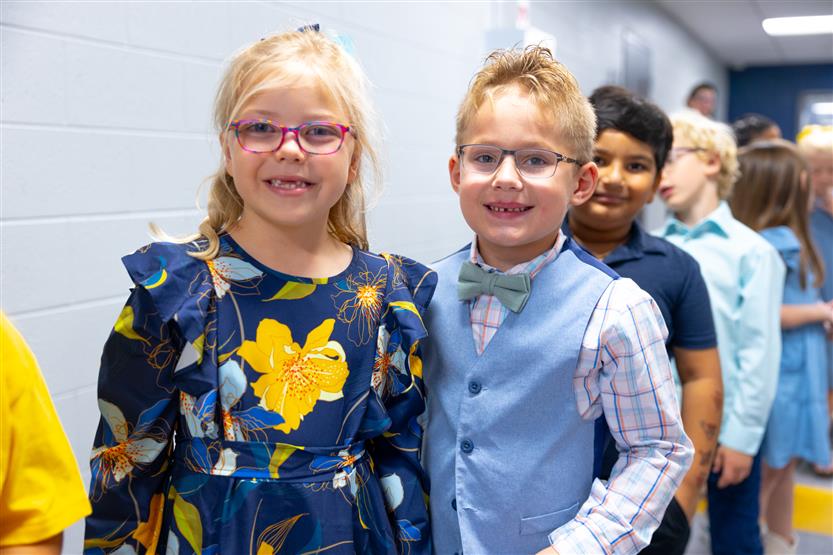 Students cut ribbon at new school